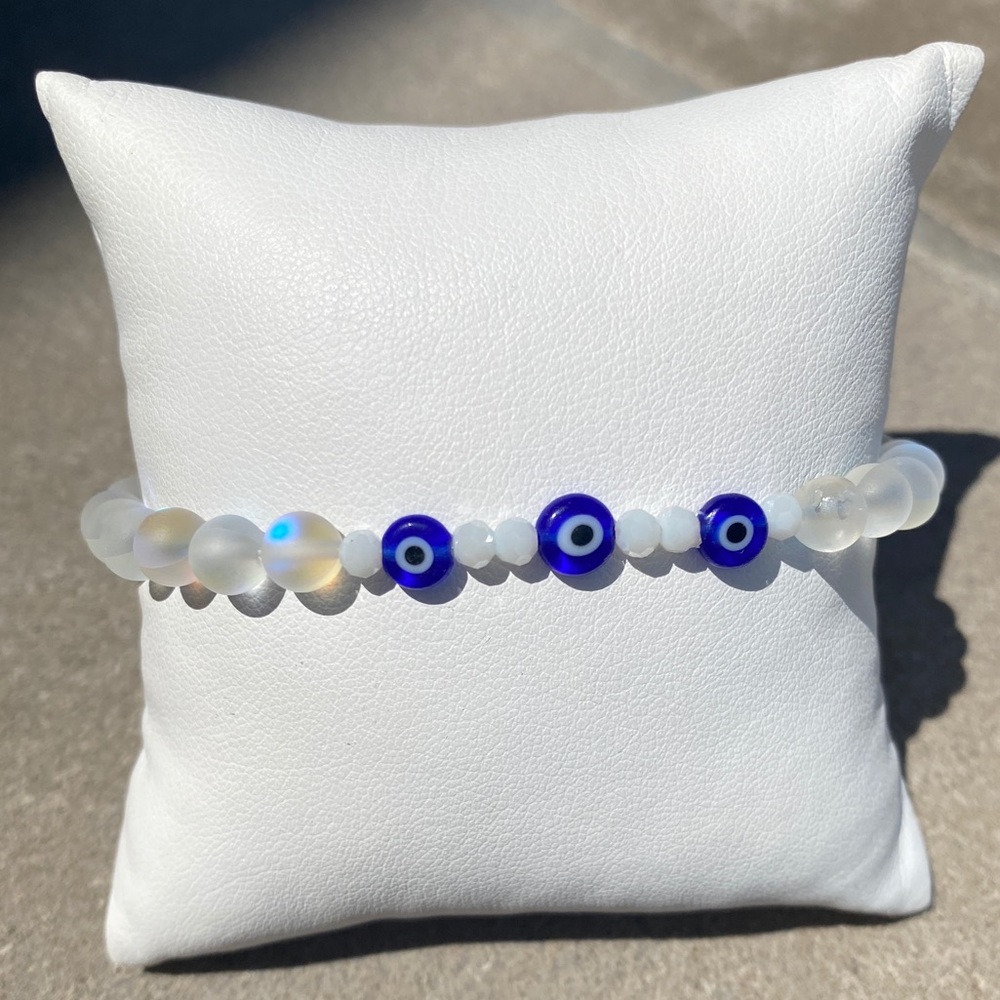 Matte frosted sea glass opal and glass evil eye